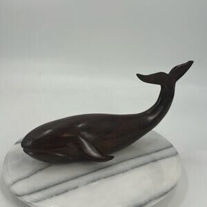 Hand carved rose wood whale statue